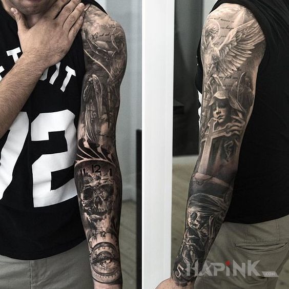 Tattoo Rękaw z krzyżem in religious motif on the forearm