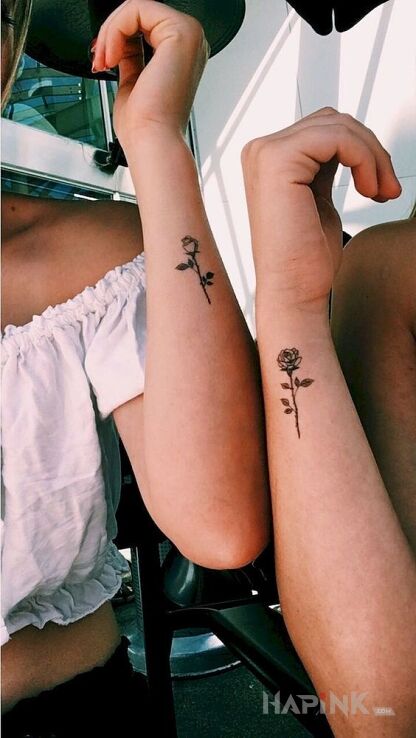 Tattoo Dwie róże in flowers motif on the forearm
