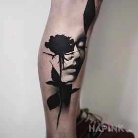 Tattoo Closed eyes on the calf motif: 3D