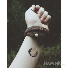 Tattoo Horn on the forearm motif: other