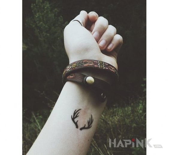 Tattoo Poroże in other motif on the forearm