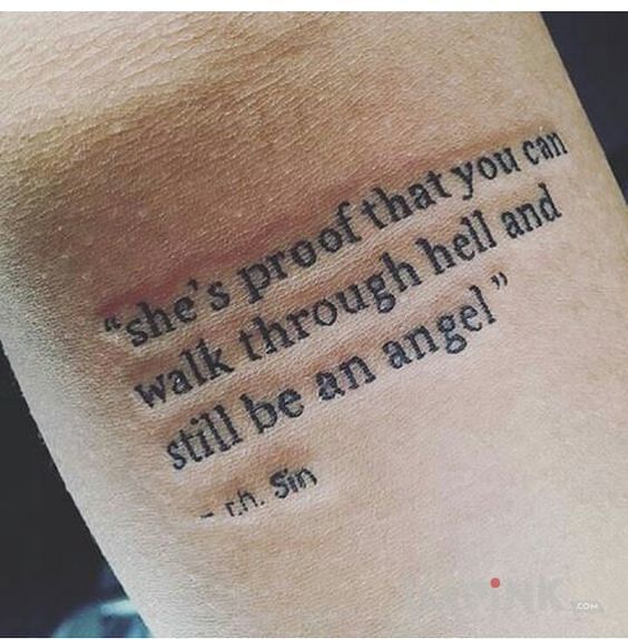 Tattoo Pieklo i bycie aniolem in lettering motif on the wrist