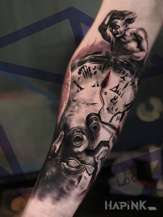 Tattoo Zegar in demons motif on the forearm