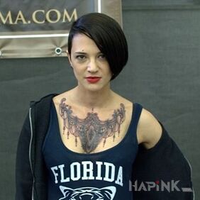 Tattoo Asia Argento - Tattoo on the chest on the chest motif: famous people