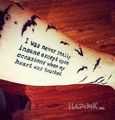 Tattoo Edgar Allan Poe in lettering motif on the forearm