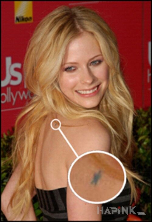 Tattoo Avril Lavigne - tatuaż gwiazdka na plecach in famous people motif on the back