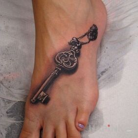 Tattoo 3D key on the foot motif: objects style: realistic