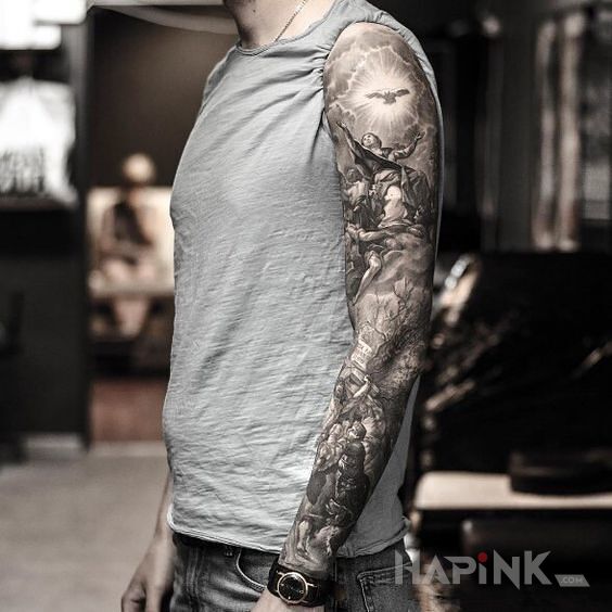 Tattoo Mocny rękaw in sleeves motif on the forearm