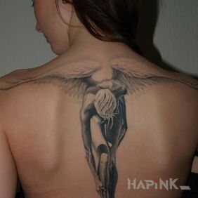 Tattoo Bright Angel on the back motif: angels style: realistic