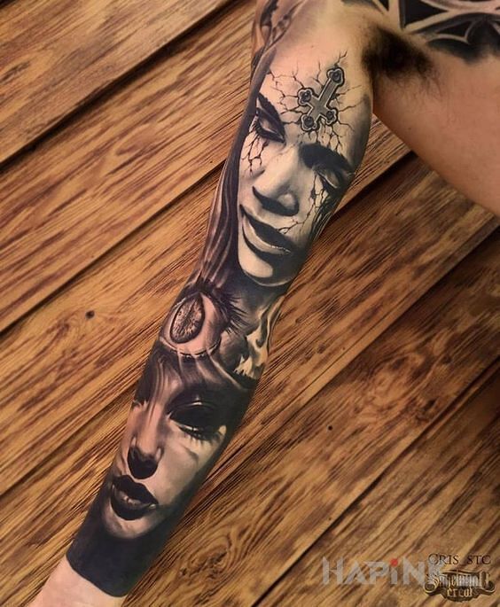 Tattoo Demony in faces motif and realistic style on the forearm