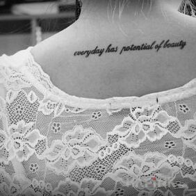 Tattoo Daily life on the back motif: lettering