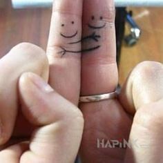 Tattoo Smieszne palce in Love motif on the fingers