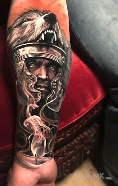 Tattoo Wilczy wojownik in colorful motif on the forearm