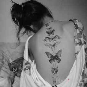 Tattoo Various butterflies on the back motif: butterflies