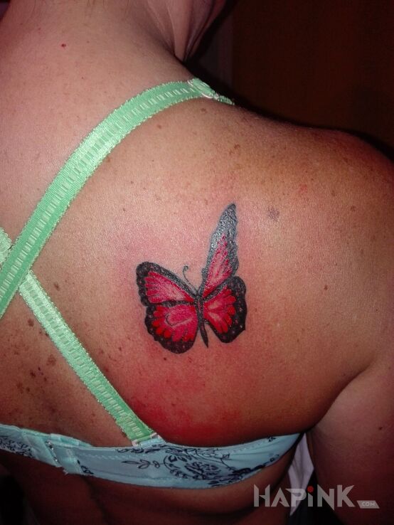 Tattoo Motylek in butterflies motif on the shoulder blades