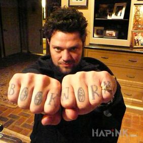 Tattoo Bam Margera on the hand motif: lettering