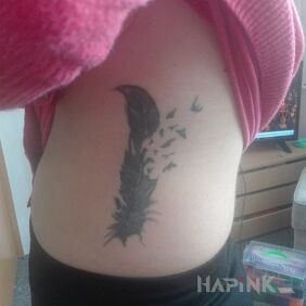 Tattoo Feather on the ribs motif: other