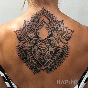 Tattoo Lotus flower on the back motif: flowers