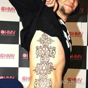 Tattoo Bam Margera - tattoo on the ribs on the ribs motif: Bam Margera