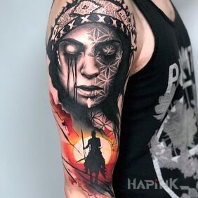 Tattoo Indian woman's cry on the upper arm motif: characters style: realistic