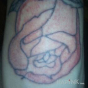 Tattoo Samorubka on the forearm motif: flowers