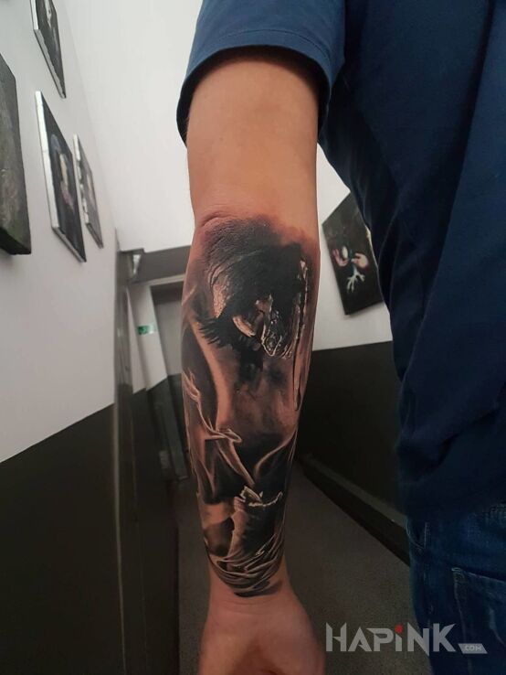 Tattoo #TATTOO in 3D motif and realistic style on the forearm