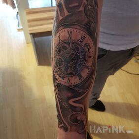 Tattoo Clock time family on the forearm motif: objects