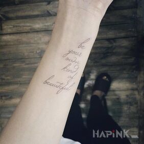 Tattoo A kind of beauty on the forearm motif: lettering