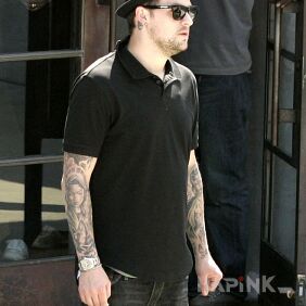 Tattoo Benji Madden - two sleeves on the forearm motif: religious
