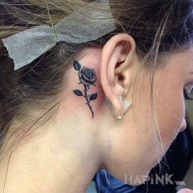 Tattoo Rose behind the ear motif: flowers