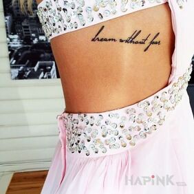 Tattoo Science on the ribs motif: lettering