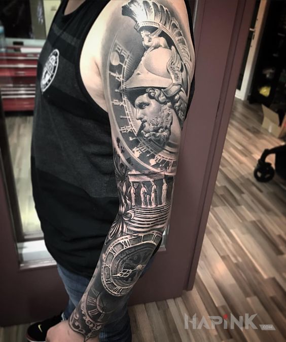 Tattoo Rzym in faces motif on the forearm
