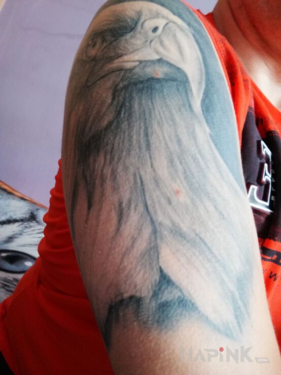 Tattoo Mój pierwszy tatuaż in animals motif on the upper arm