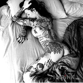 Tattoo Black and white on the buttocks motif: faces
