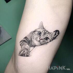 Tattoo Cat on the leg motif: animals style: realistic