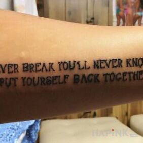 Tattoo Break yourself on the forearm motif: lettering