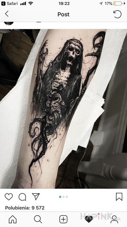 Tattoo Demoniczna postać in skulls motif on the forearm