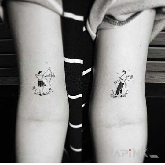 Tattoo Trafiony na amen in Love motif on the upper arm