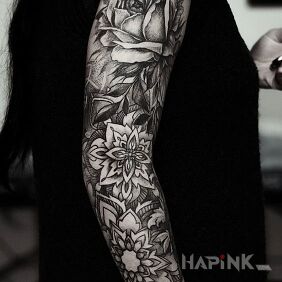 Tattoo Flower and mandala on the forearm motif: mandalas