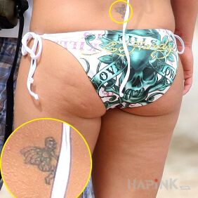 Tattoo Britney Spears - tattoo on her back on the back motif: Britney Spears