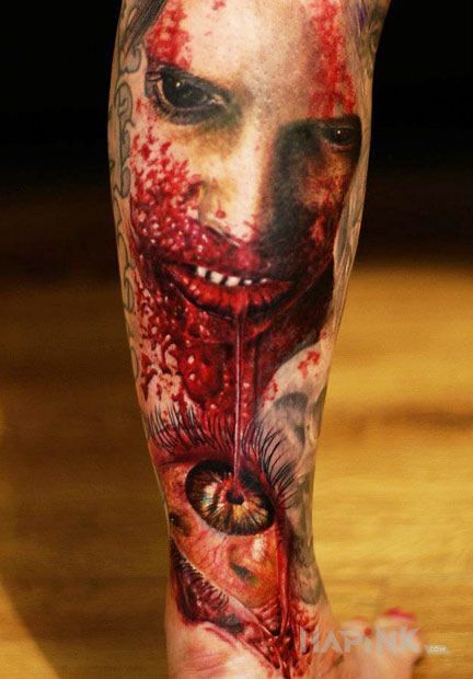 Tattoo Zombie in faces motif and realistic style on the calf