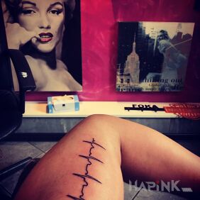 Tattoo ECG heartbeat on the upper arm motif: other