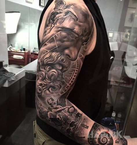 Tattoo Głowa mędrca in sleeves motif on the upper arm