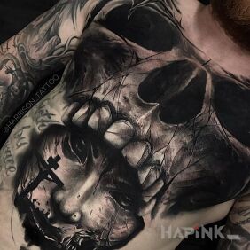 Tattoo Demon over the cross on the chest motif: skulls style: realistic