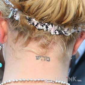 Tattoo Britney Spears neck inscription on the nape motif: lettering