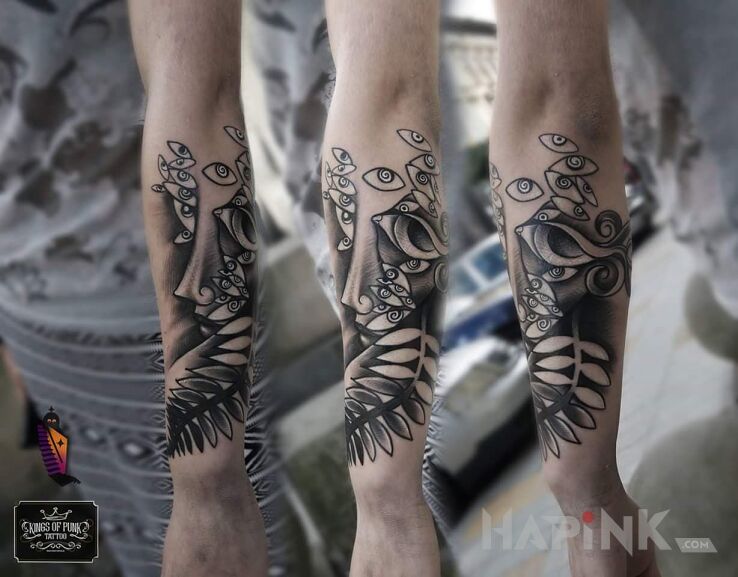 Tattoo Tamara in flowers motif on the forearm