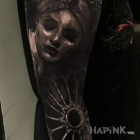 Tattoo Female face on the forearm motif: faces style: realistic