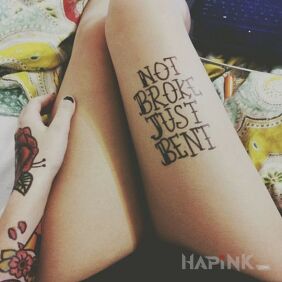 Tattoo Unbroken on the leg motif: lettering