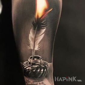 Tattoo Burning pen on the forearm motif: lettering style: realistic