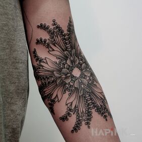 Tattoo Gray flower on the forearm motif: flowers